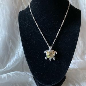 Silver tone chain with green enamel turtle pendant necklace
